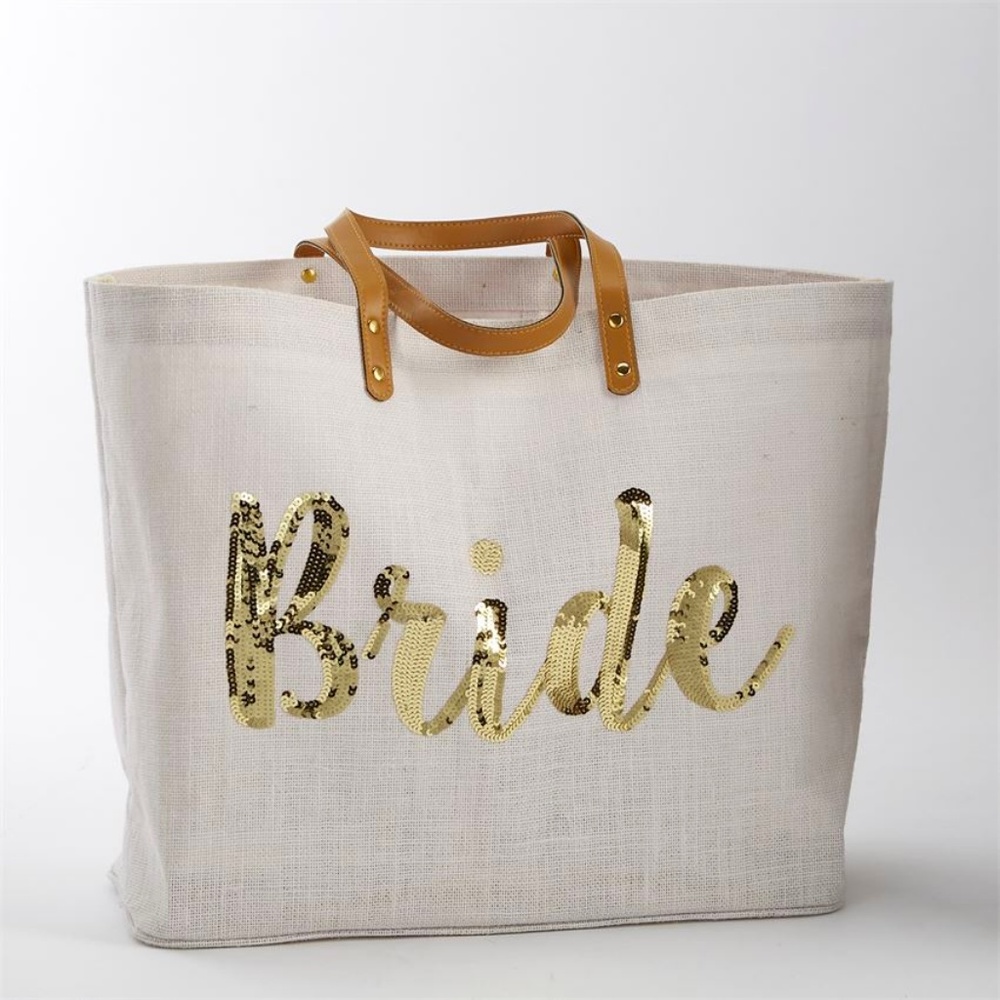 NWOT Jute tote features gold sequin "Bride" tote